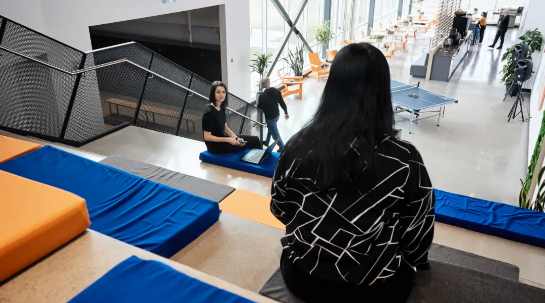 Inspiring Workplace for Collaboration Employees enjoying the inspiring and collaborative office environment